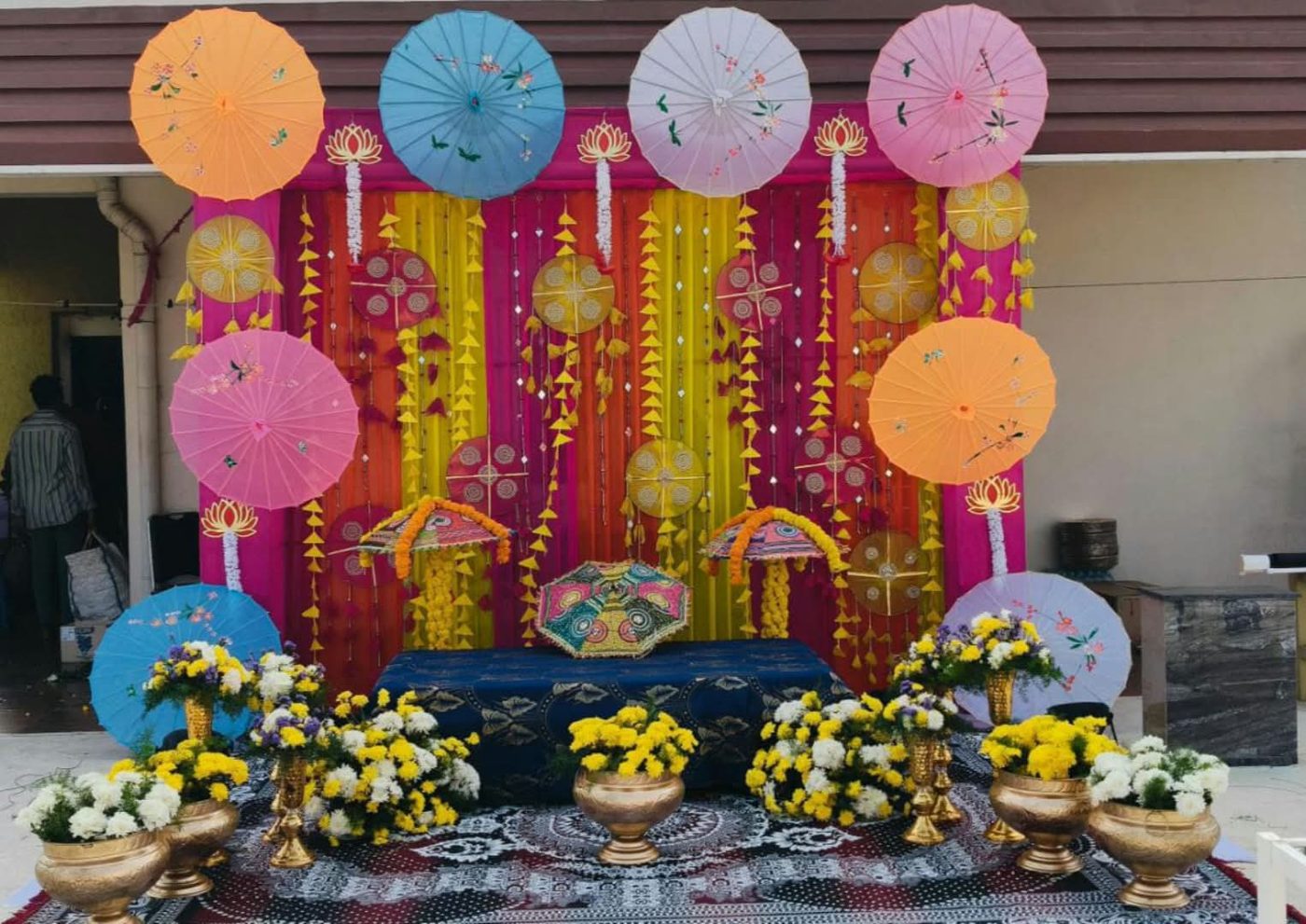 Mehendi decoration with colourful umbrellas